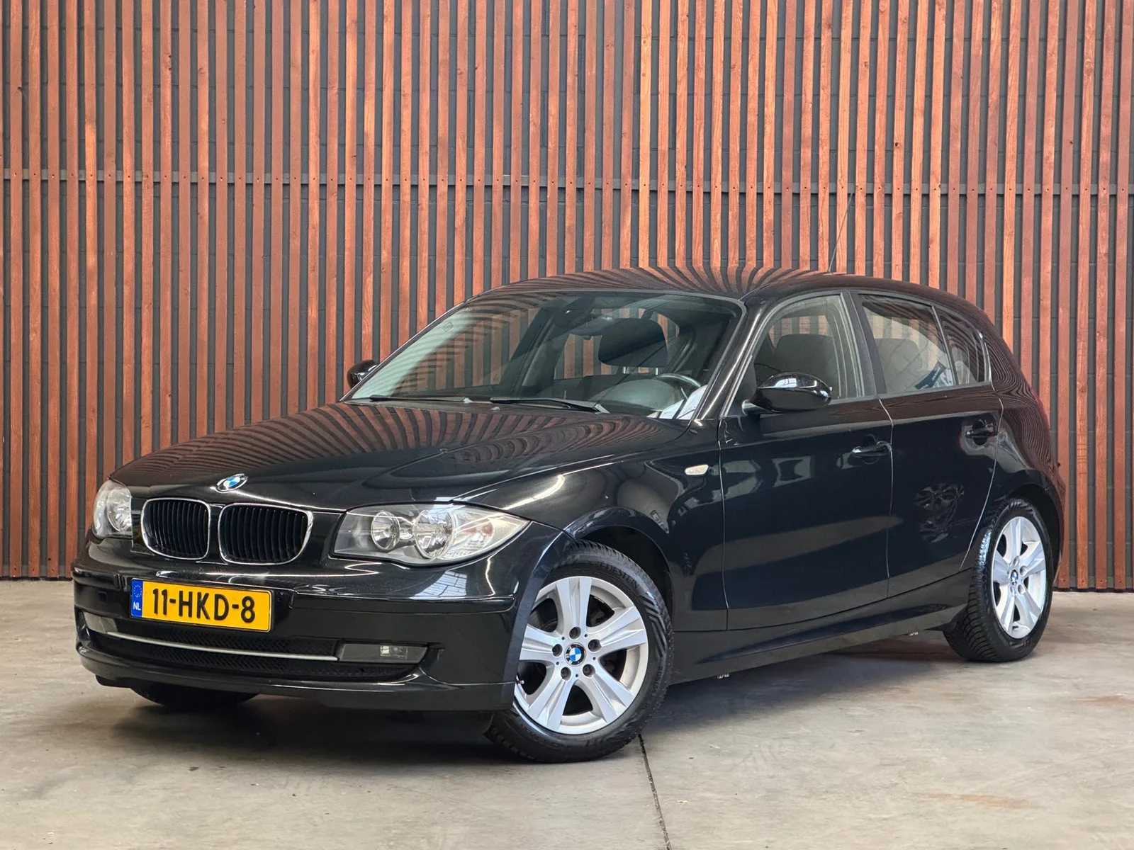 BMW 1-Serie (2009) — foto 1