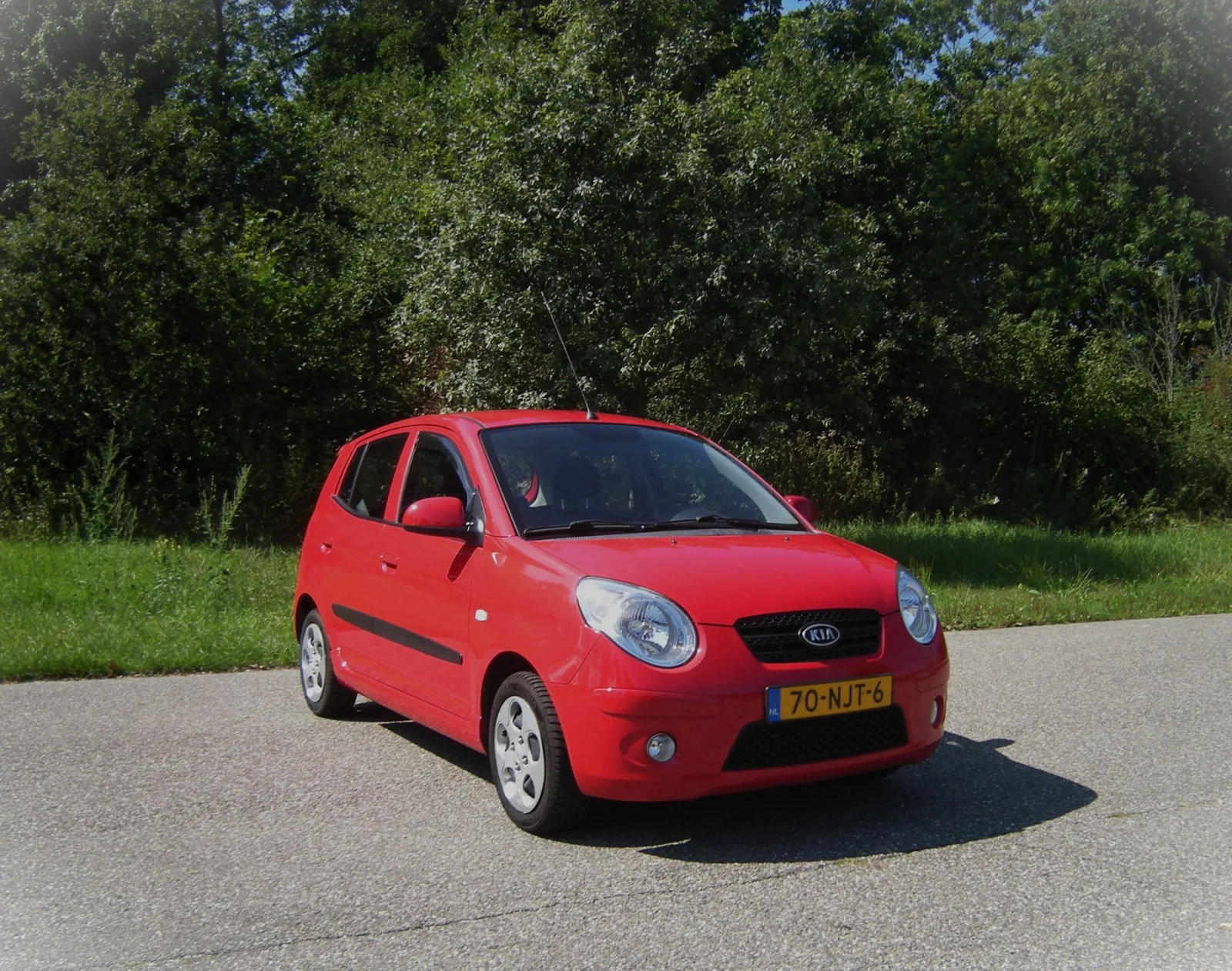 Kia Picanto (2010) — foto 1